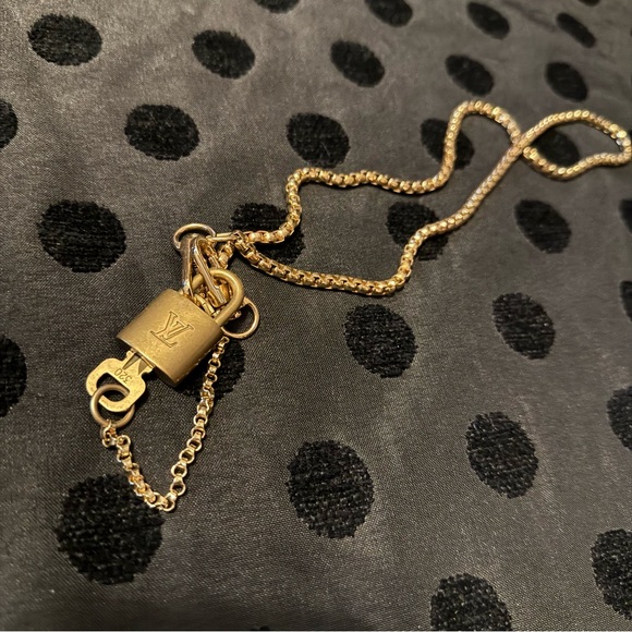 Louis Vuitton Brass Lock & Key 320 on chain - Picture 1 of 3